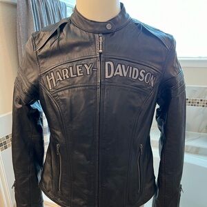 Women’s Harley Davidson leather jacket with attachable hoodie.